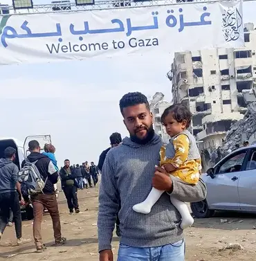 Mohammed Al-Shanti with his son Ibrahim and infant daughter - Gaza family seeking direct aid